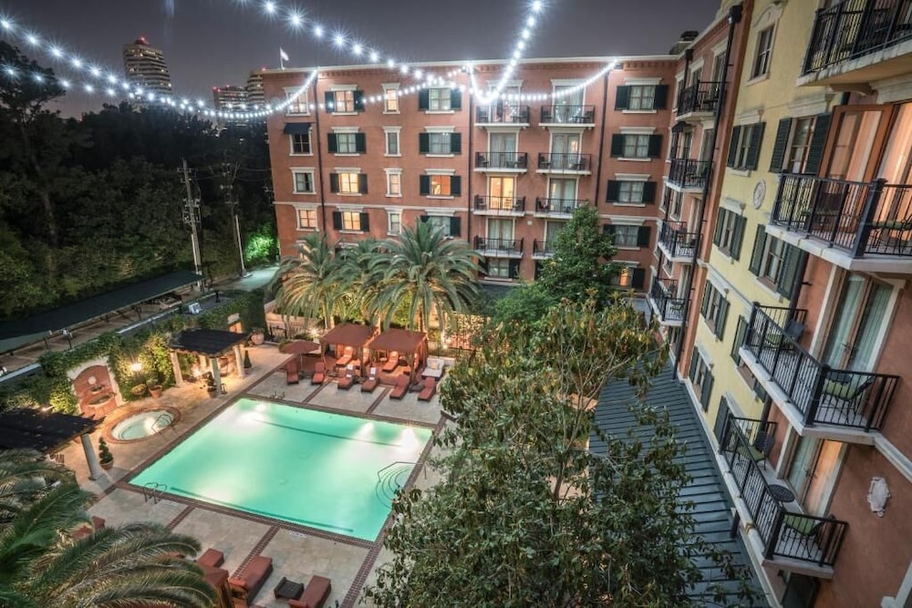 One Bedroom Suite with Two Full Beds Pool View Balcony - Photo 5