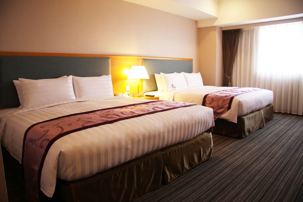 Deluxe Quadruple Room, 2 Queen Beds