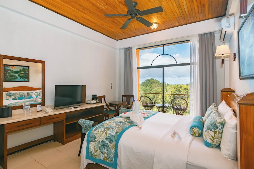 Deluxe Room with Partial Ocean View, One king bed - Photo 2