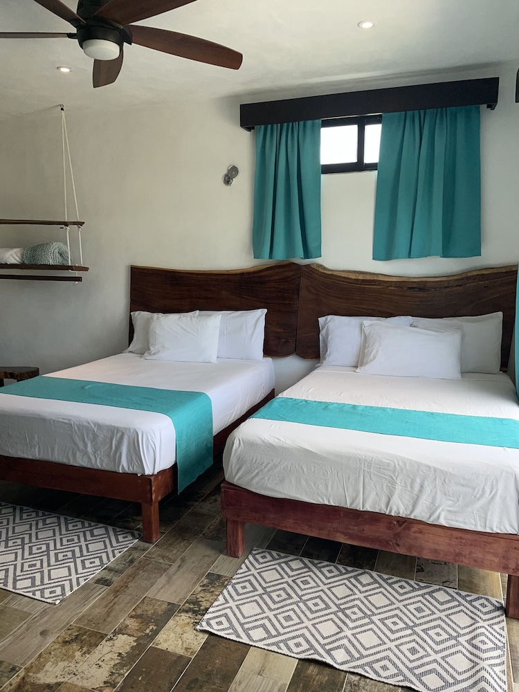 Design Quadruple Room, 2 Queen Beds, Non Smoking, Resort View photo 1