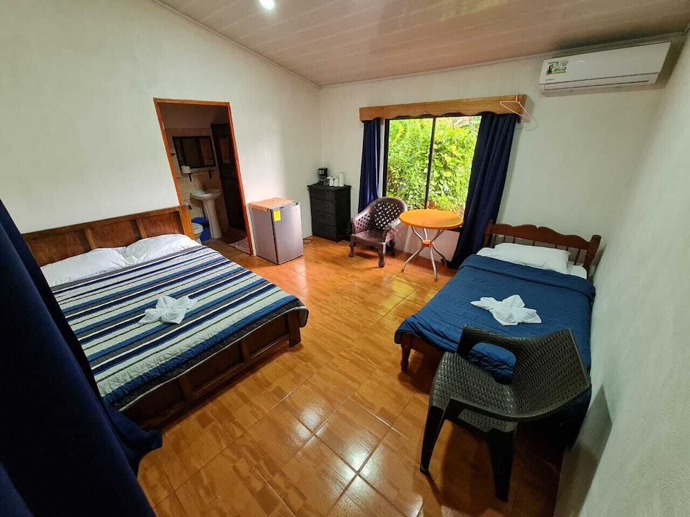 Basic Triple Room, Beach View photo 1
