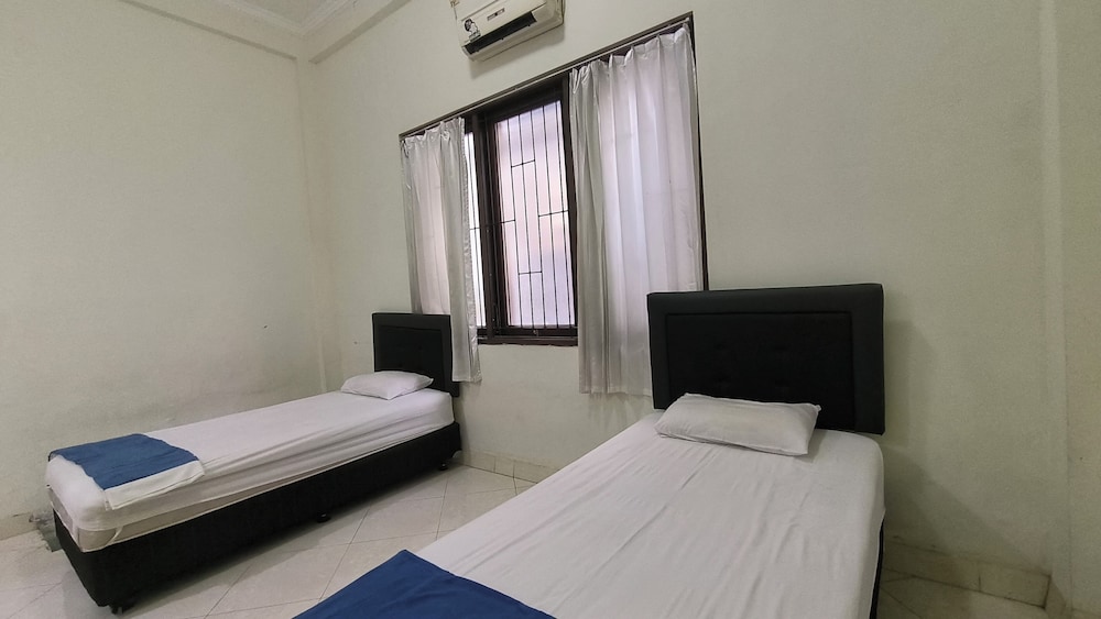 Deluxe Twin Room - Photo 11