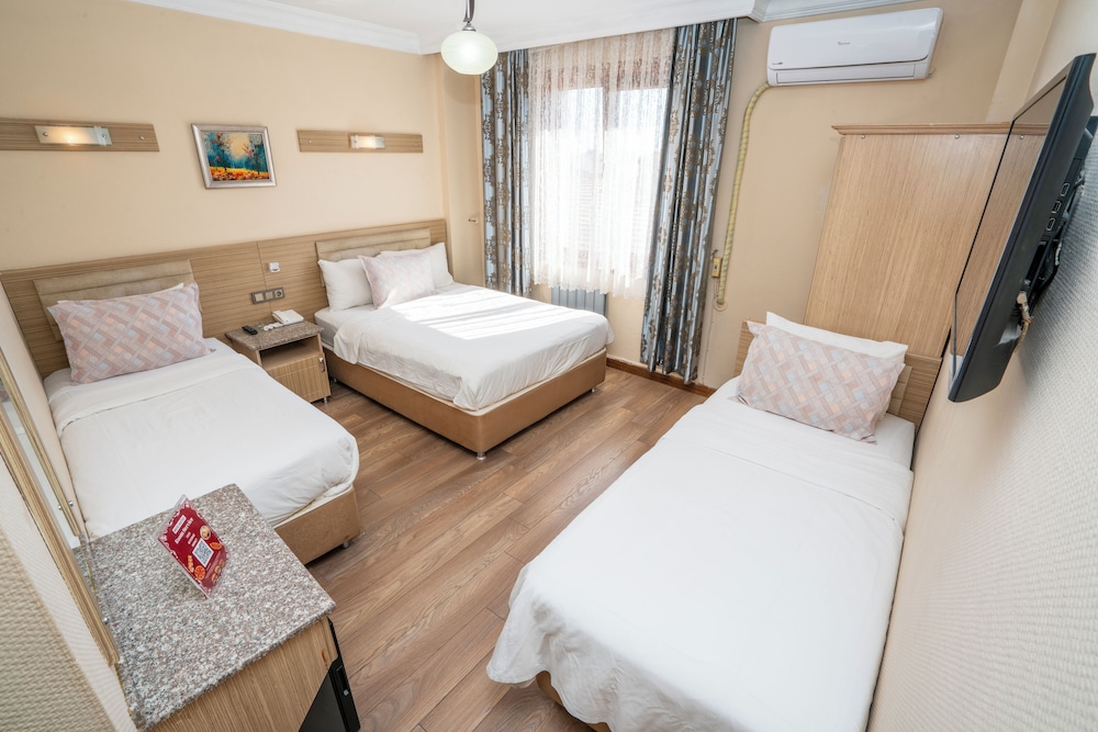 Standard Quadruple Room, Multiple Beds, City View photo 1