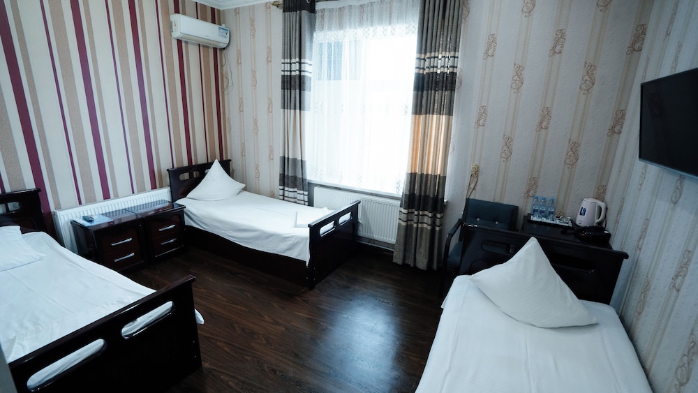 Standard Triple Room, City View photo 1