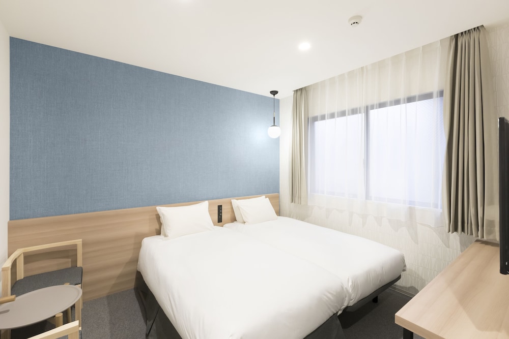 Twin Room with Extra bed - Photo 1