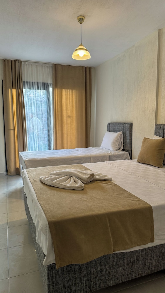 Standard Triple Room, Garden View, Garden Area photo 1