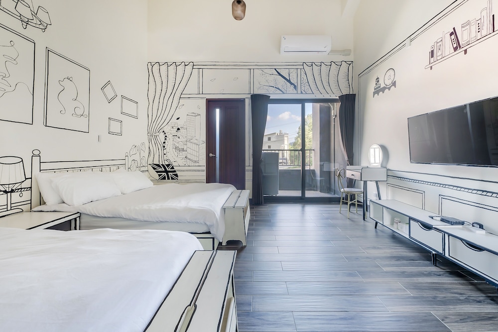 Deluxe Quadruple Room - Photo 8