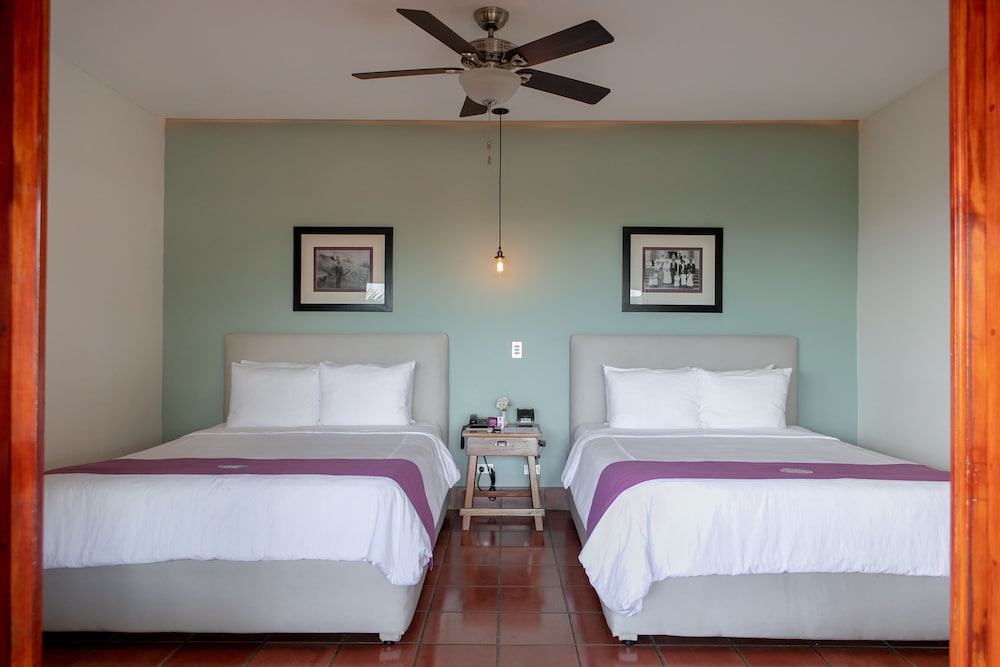 Deluxe Room, 2 Queen Beds, Balcony - Photo 2