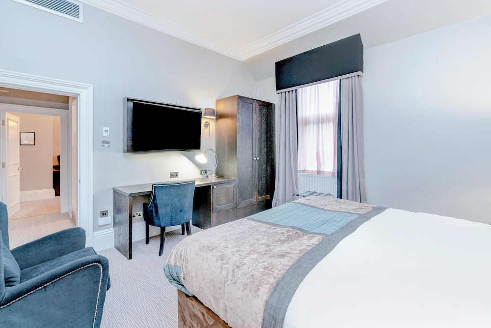 Deluxe Triple Suite - Photo 8