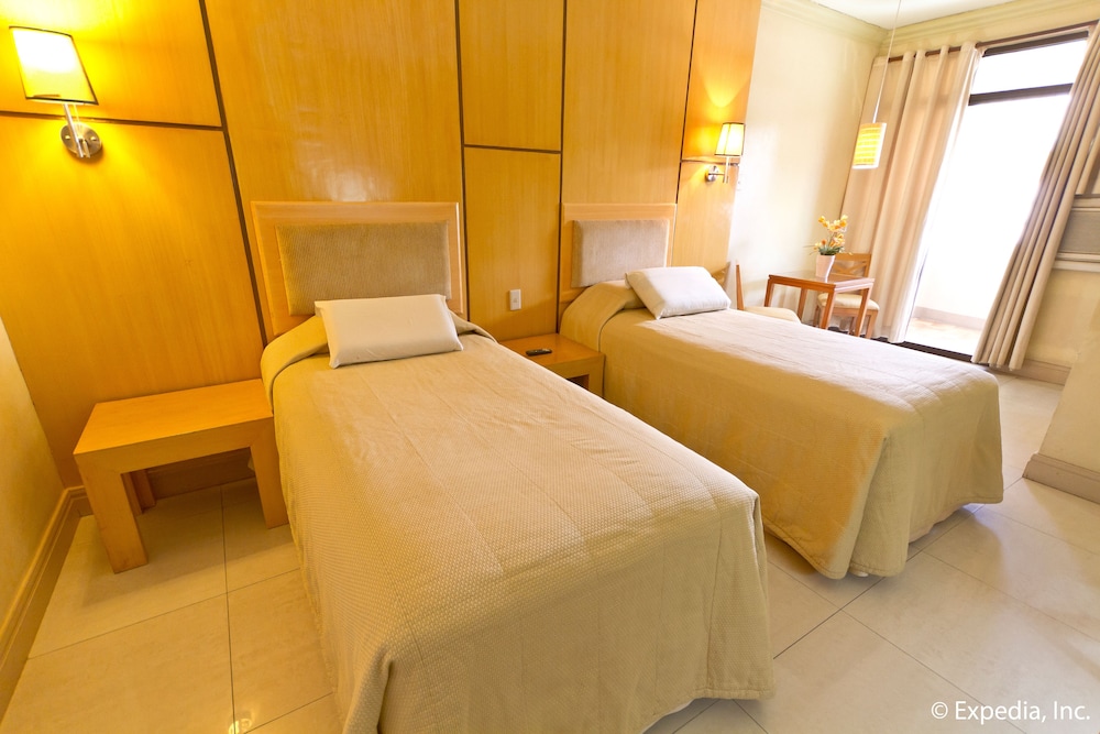 hotel room with two beds and one desk? it looks like the other