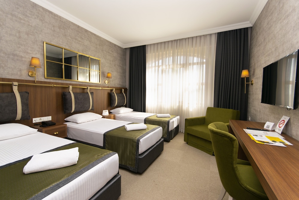Standard Triple Room - Photo 8