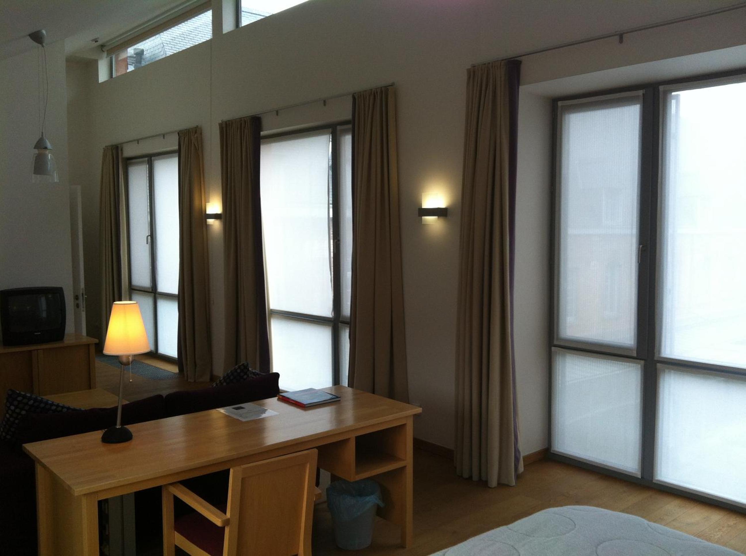 King Suite with Balcony - Photo 1