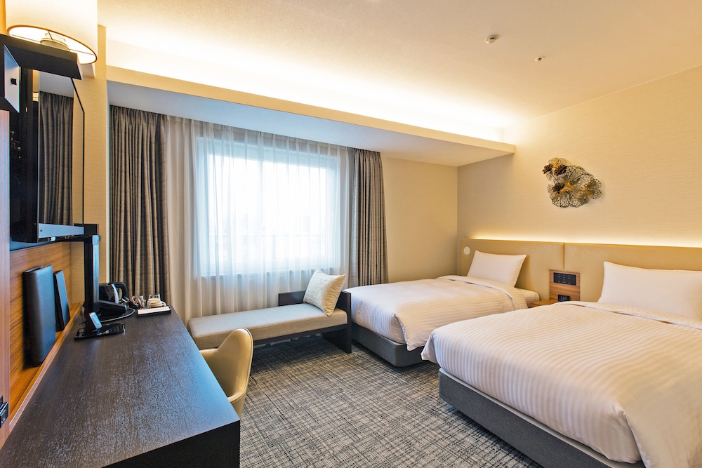 Deluxe Twin Room Single Use - Non Smoking photo 2