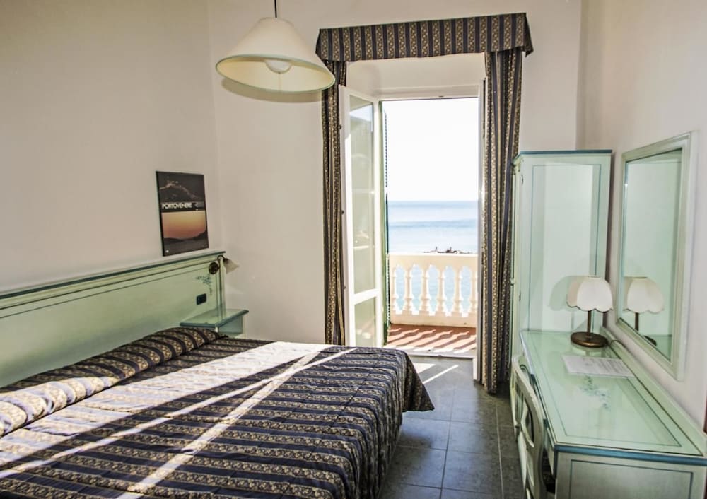 Quarto Triplo, Vista para o Mar