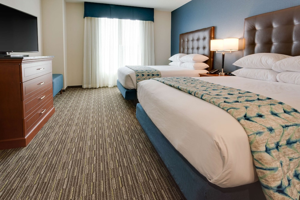 Suite, 2 Queen Beds, Refrigerator & Microwave (Sofabed, 2 Rooms, Hearing, Tub)