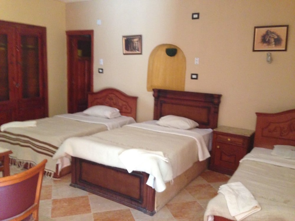 Deluxe Triple Room, Garden View photo 2