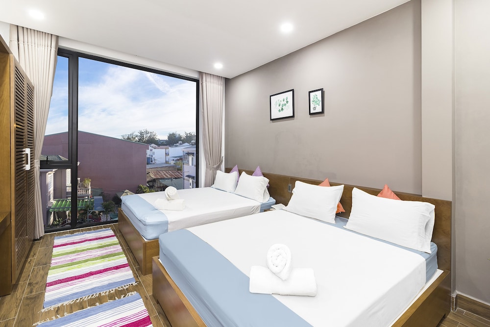Deluxe Quadruple Room, City View