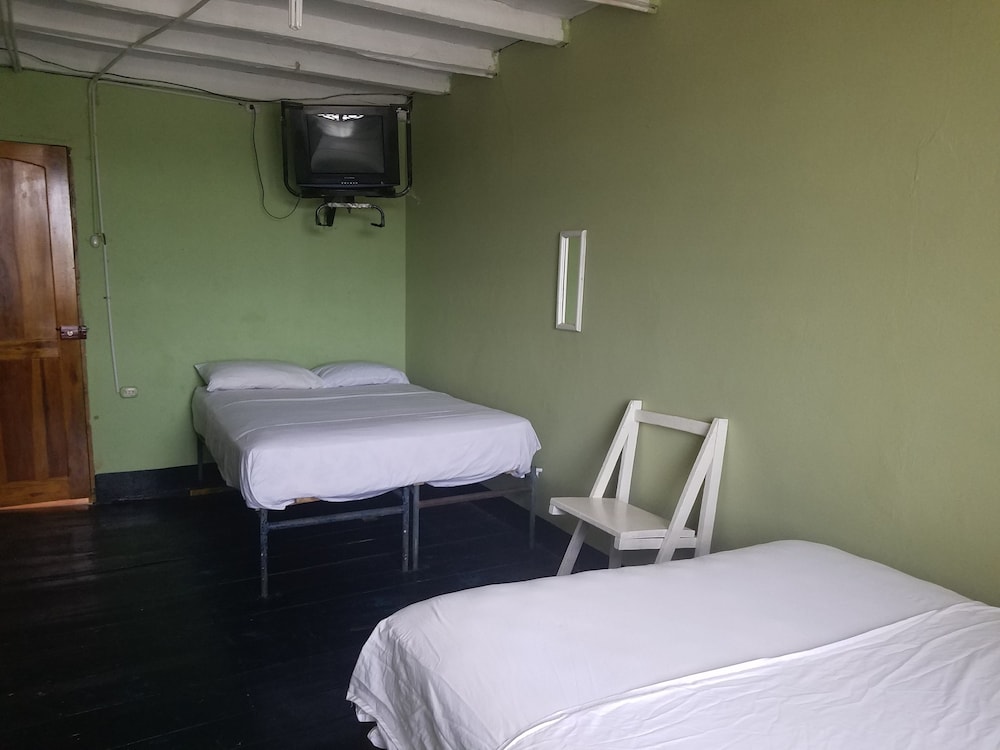 Basic Quadruple Room, 2 Double Beds, Private Bathroom photo 1