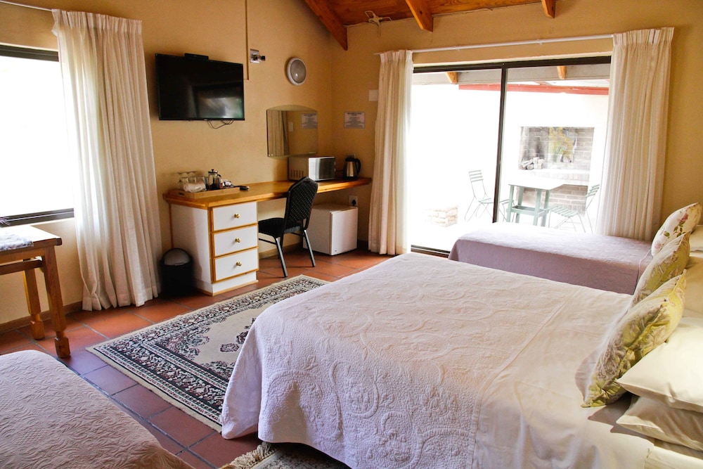 Family Quadruple Room, Multiple Beds, Garden View photo 2