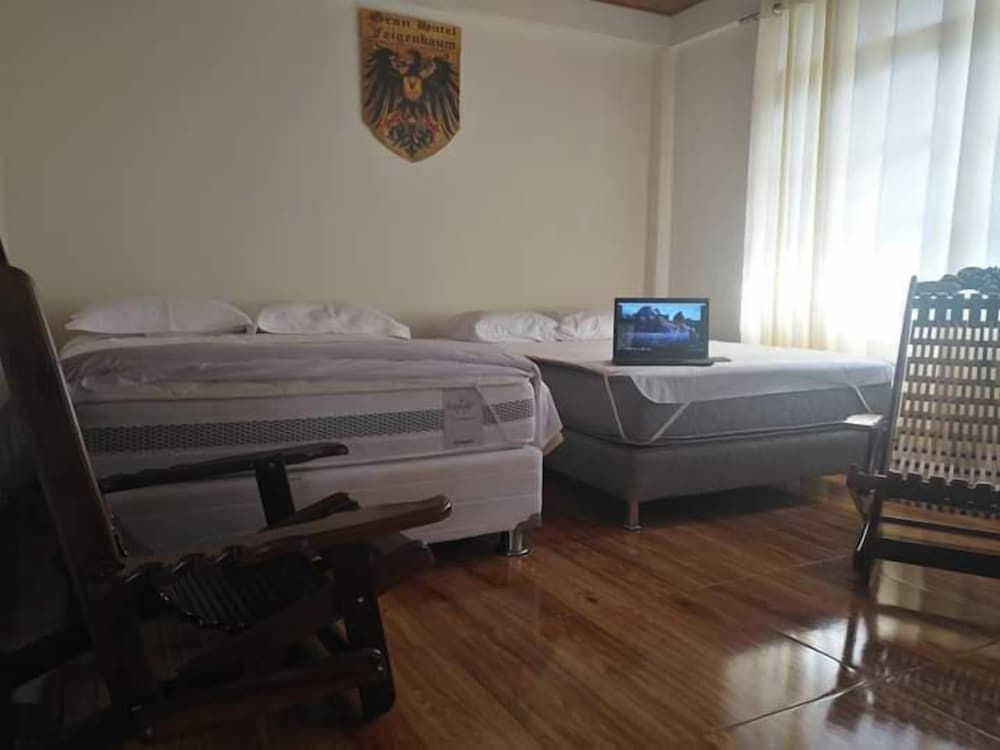 Comfort Triple Room, 2 Queen Beds, Mountain View photo 3