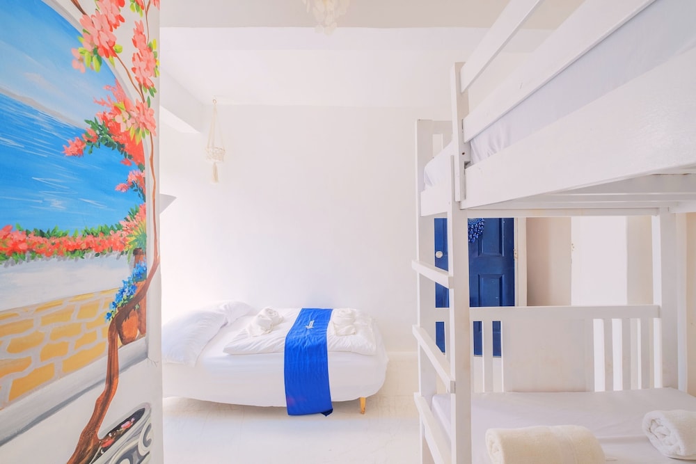 Deluxe Quadruple Room - Photo 7