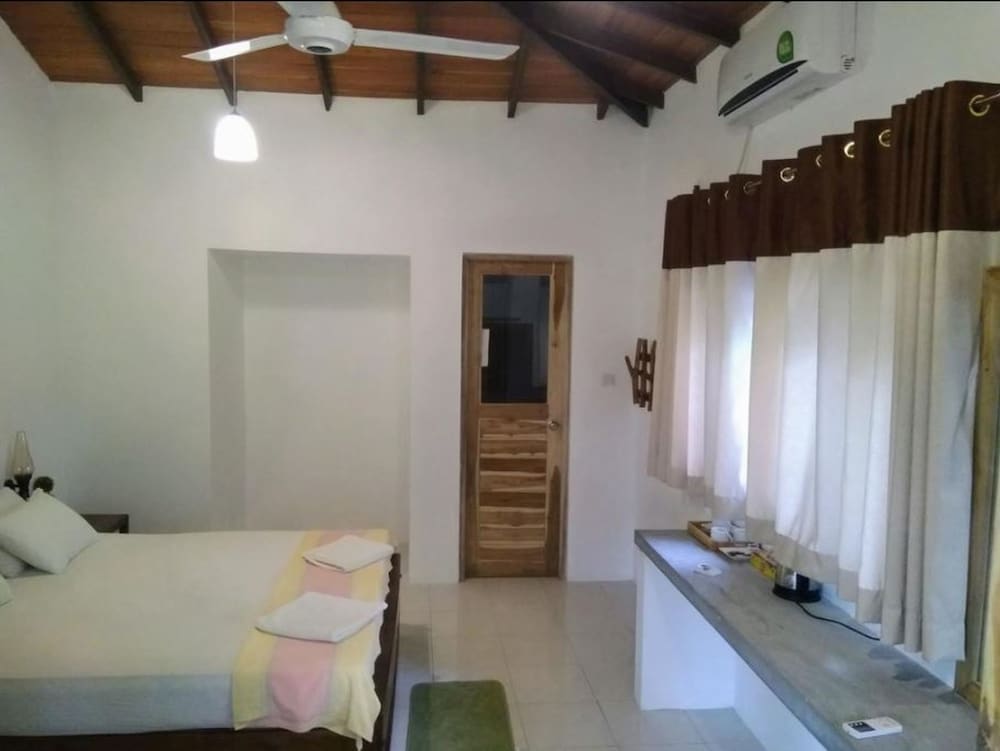 Deluxe Quadruple Room, Multiple Beds, Garden View photo 1