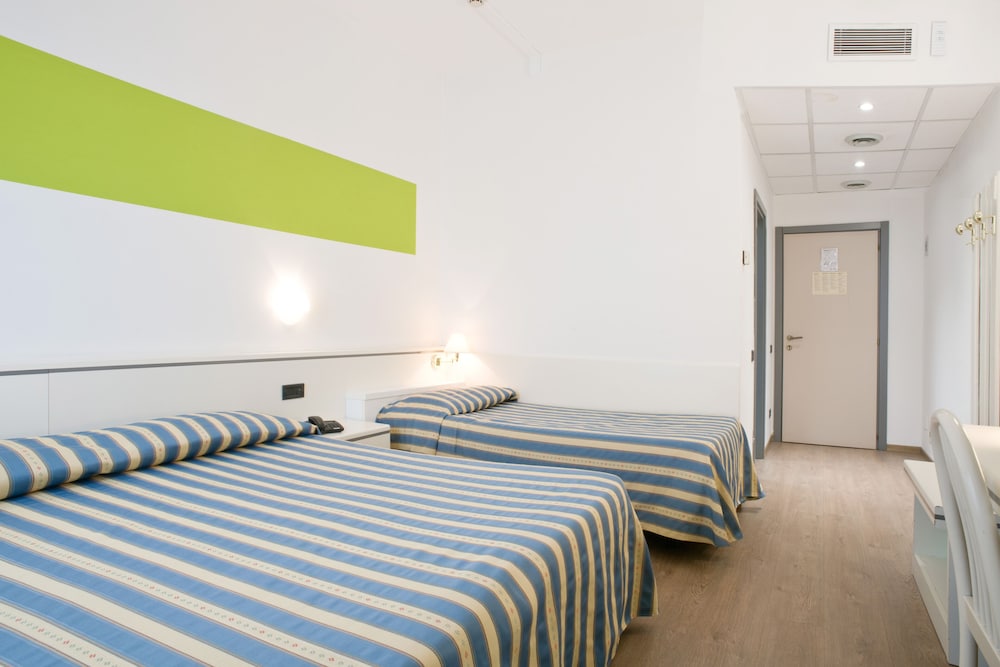 Economy Triple Room, Balcony photo 1