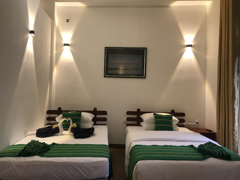 Deluxe Triple Room, 1 Bedroom, Garden View photo 2