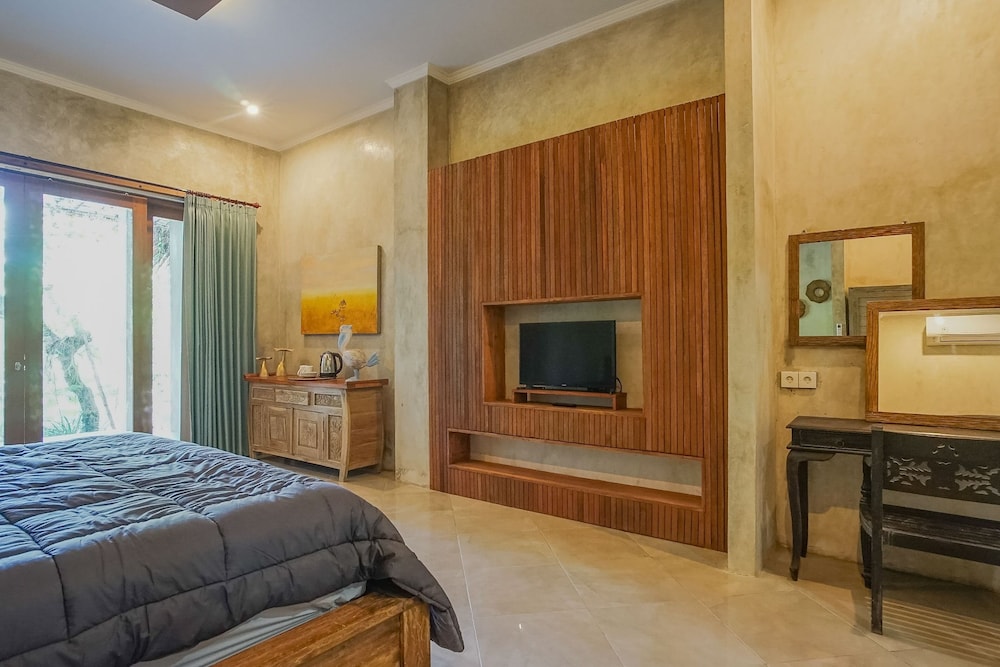 Deluxe Room, Garden View - Photo 17