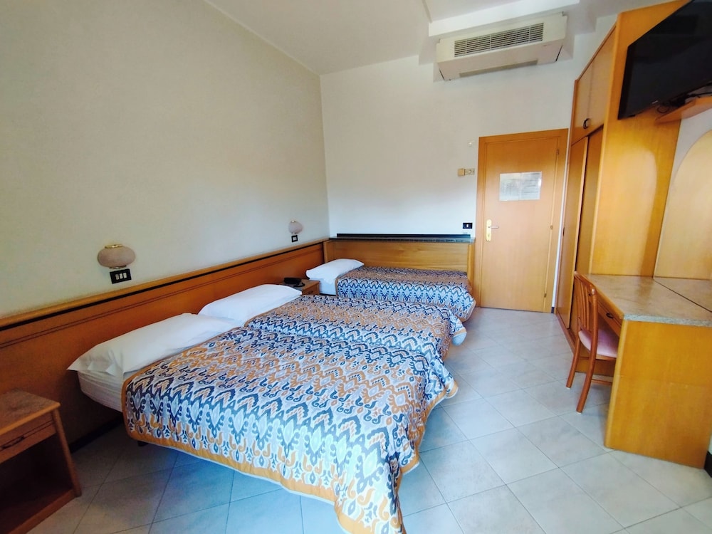 Economy Triple Room, Balcony photo 1