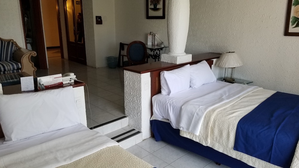 Standard Quadruple Room, 2 Double Beds, Garden View photo 2