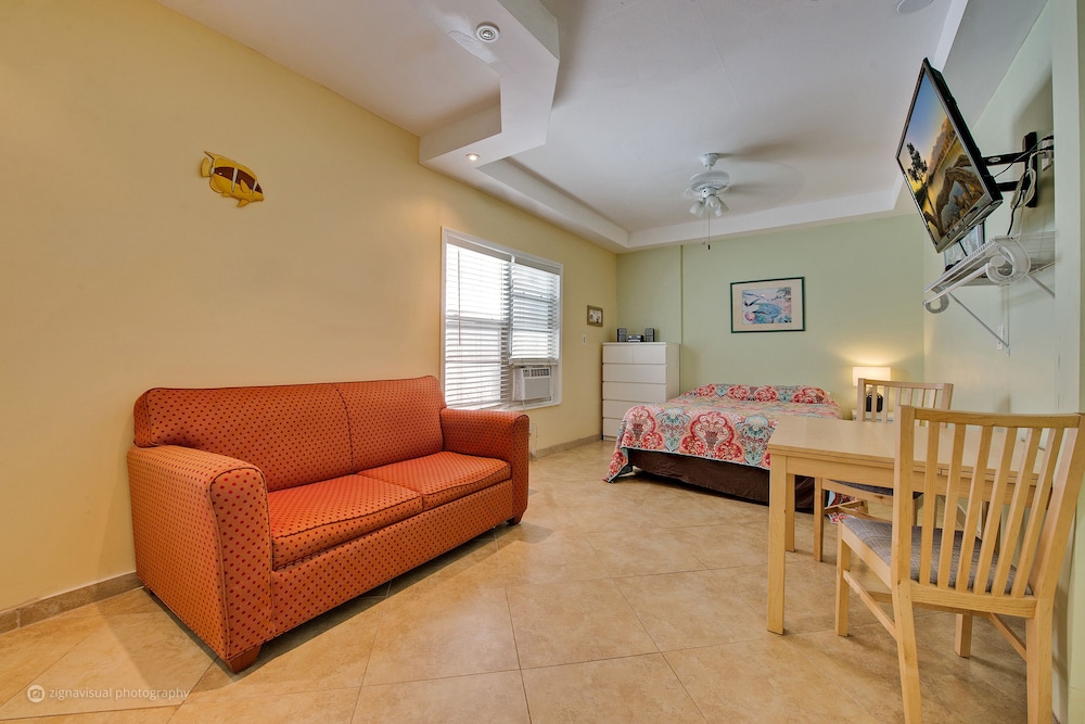 #8 = Sandbar Suite = 1 bedroom w/ queen sized bed and sofa pullout couch into a full sized bed