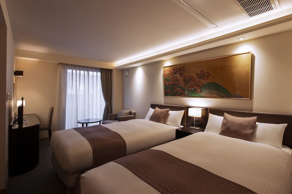 Premium Twin Room - Photo 2