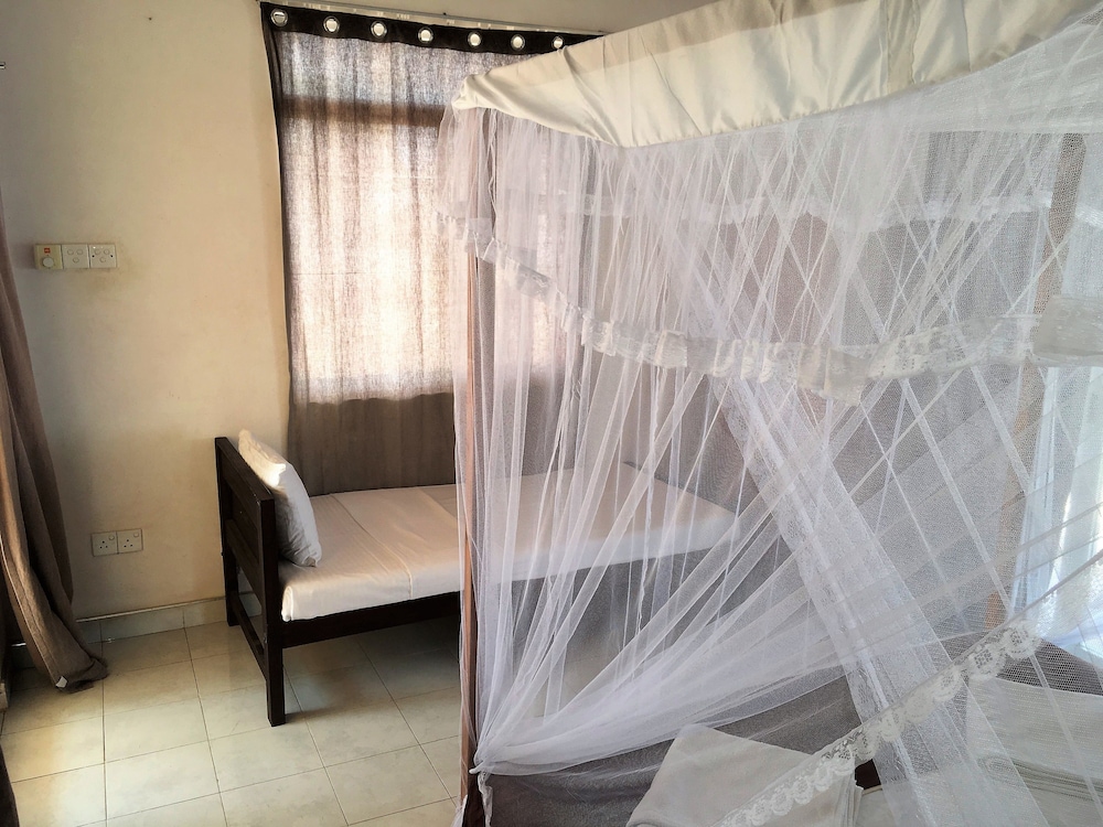 Deluxe Triple Room with Lagoon & Sea View