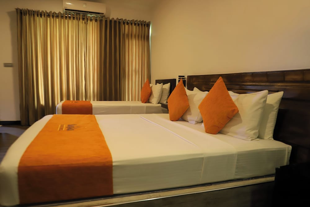 Deluxe Triple Room, Balcony, Garden View photo 1