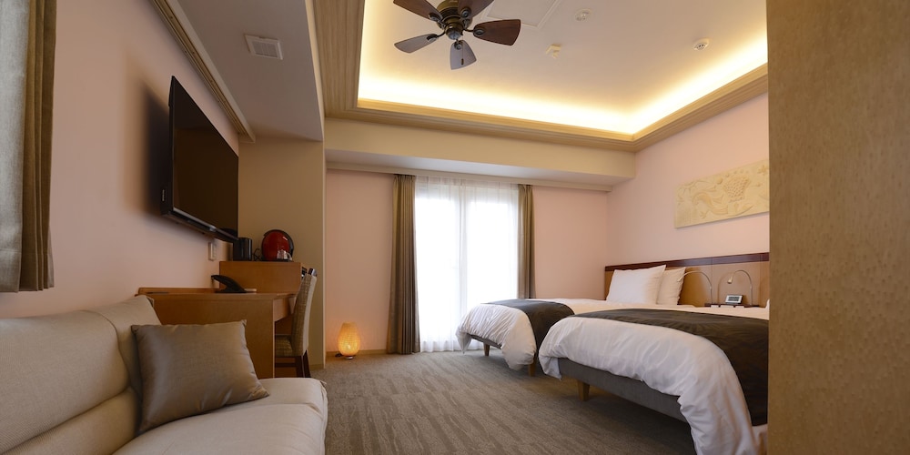 RAM Deluxe Room (3 People Use & sofa bed is only available for the 3rd) - Photo 1