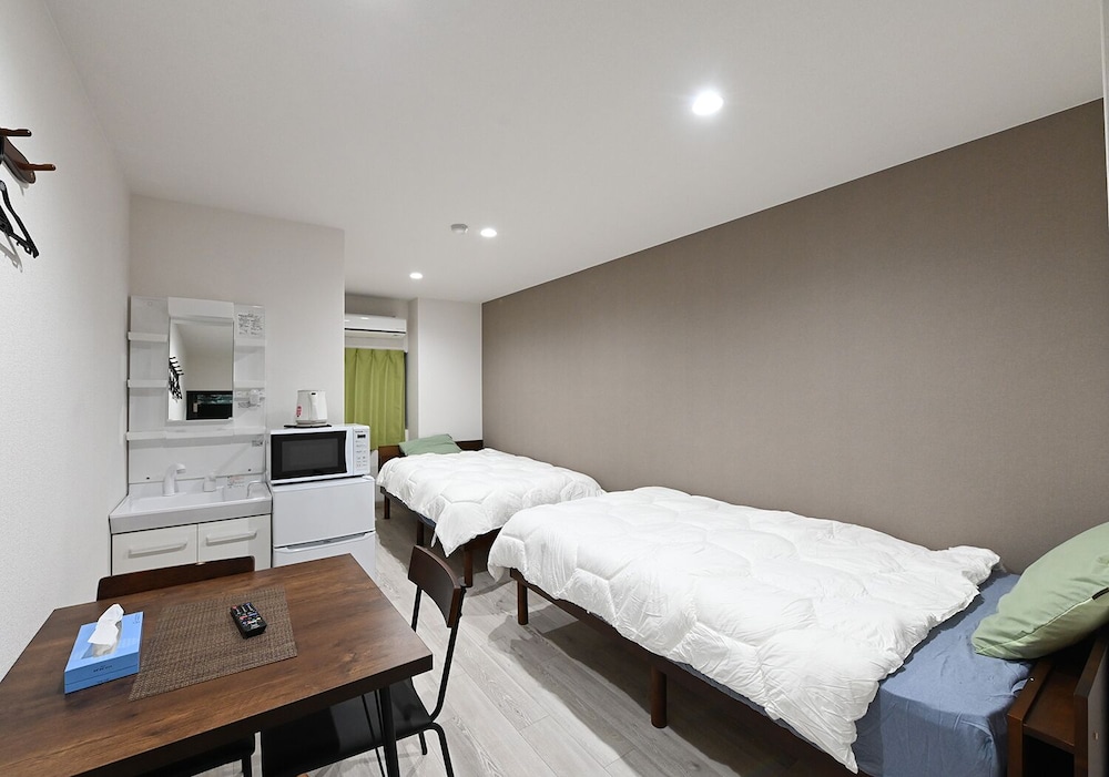Twin Room - Photo 1