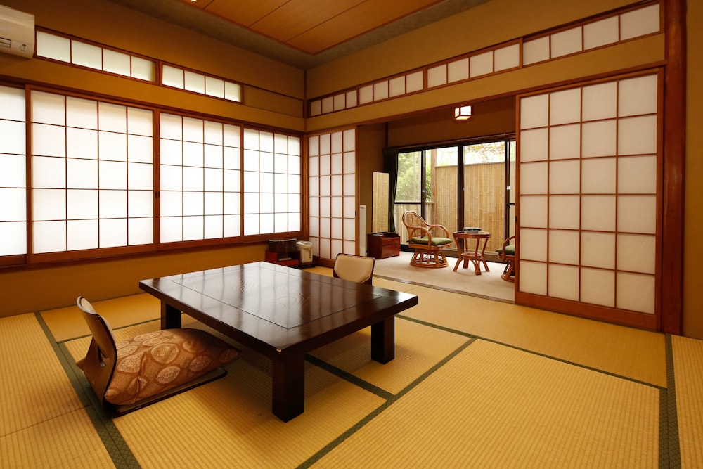 Japanese Style Quadruple Room with Separate Sitting Area (Private Hot Spring Bath) photo 1