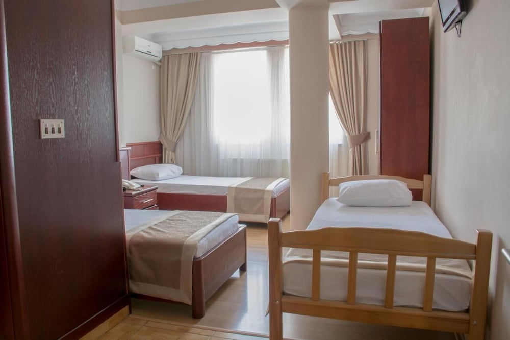 Basic Triple Room photo 3