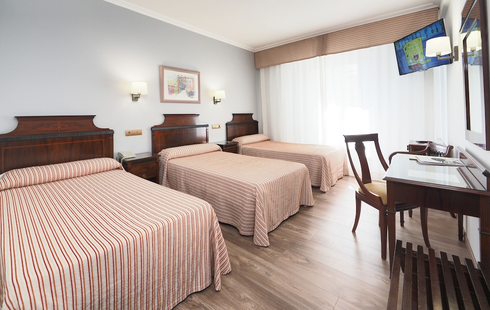 Triple Room - Photo 1