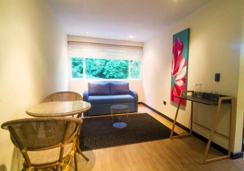 Deluxe Quadruple Room, Garden View photo 2