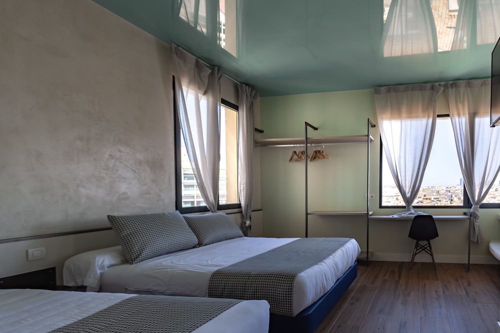 Habitación Triple con Vista a la Ciudad