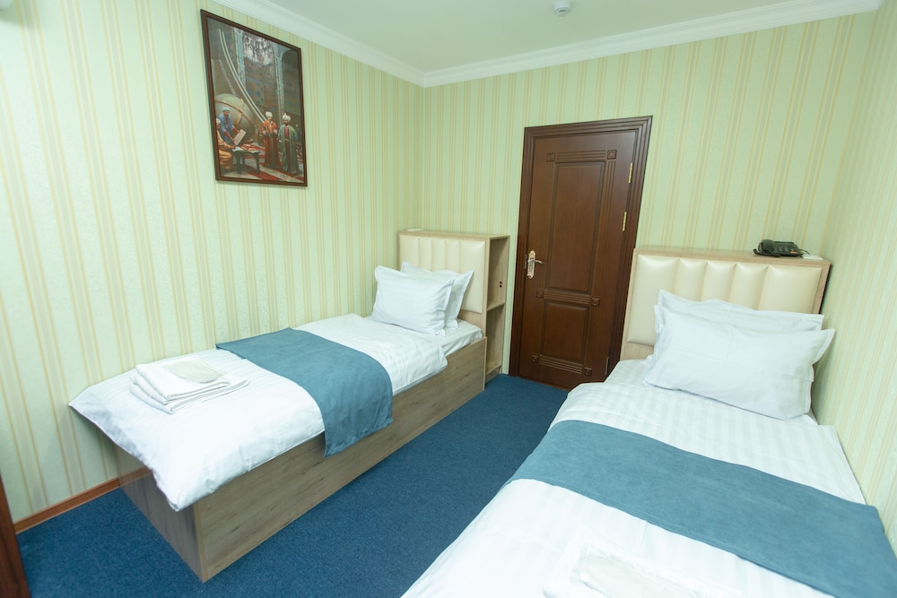 Standard Twin Room - Photo 7
