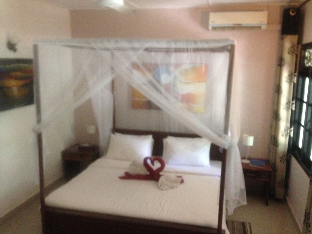 Standard Triple Room, 1 Bedroom, Garden View photo 1