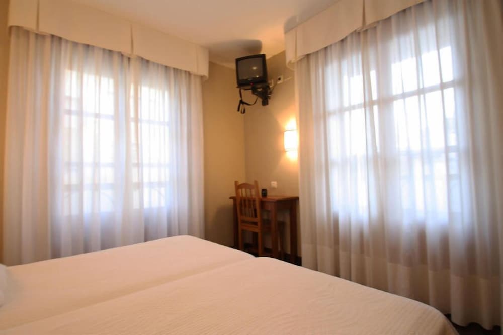 Habitación Doble Estándar o con Dos Camas Individuales.