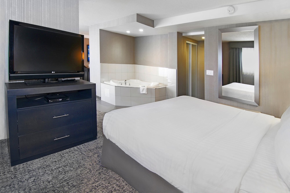 Suite, 1 King Bed with Sofa bed, Jetted Tub - Photo 1