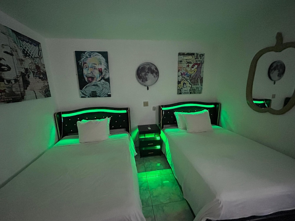 Luxury Room With 2 Double Beds & Couch Bed
