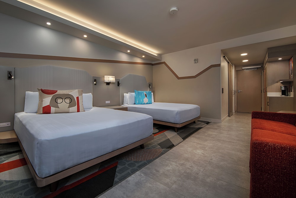Main Tower - Theme Park View. Hearing accessible - visual alarms and notifications. 2 queen beds, 1 photo 1