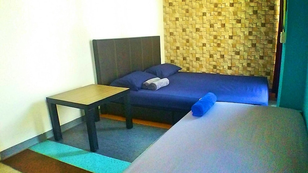 Triple Room, Shared Bathroom (With Fan) photo 2