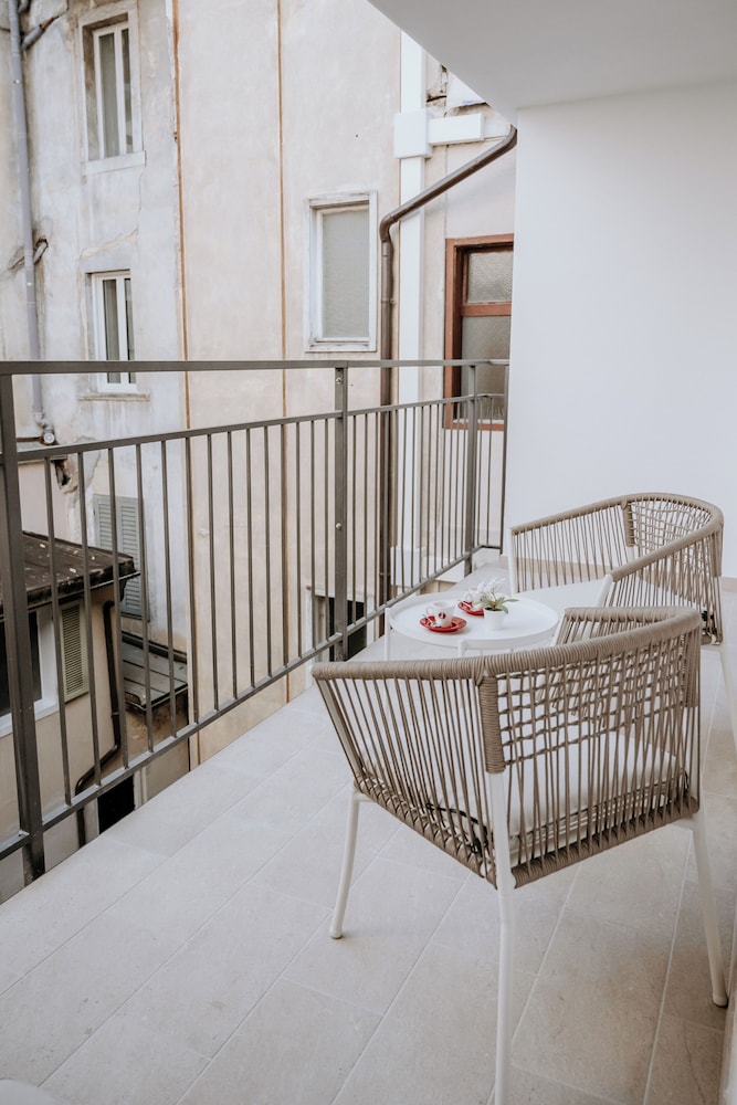 Family Quadruple Room, Balcony, Courtyard View, photo 6